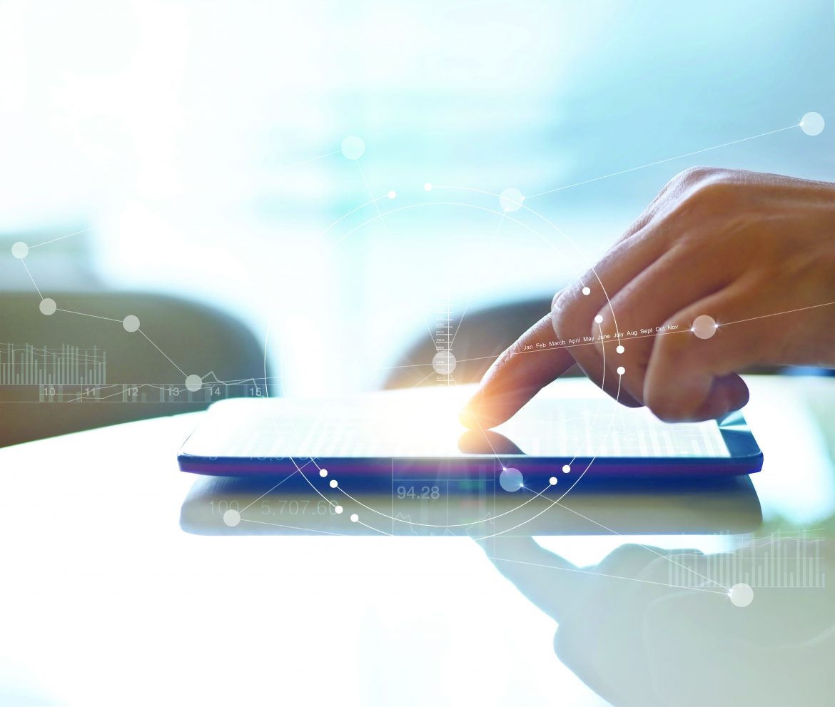 Hand of stock investment using smartphone for checking worldwide